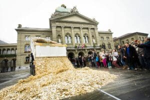 Swiss basic income protest, 2013. Photo by Stefan Bohrer – CC BY 2.0.